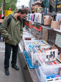 An occupier browses titles at the Occupy Wall Street library