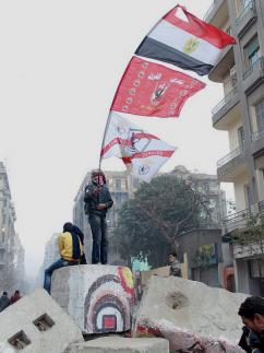 A Zamalek ultra joins in street battles in Cairo during protests about the Port Said massacre (Bora S. Kamel)