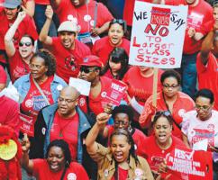 Chicago teachers took to the streets of downtown to demand a fair contract Chicago teachers took to the streets of downtown to demand a fair contract