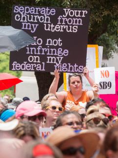 Abortion rights activists crowd around the Texas state Capitol building (David Weaver)