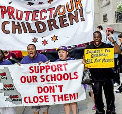Protesters marched across the South and West Sides of Chicago to protest school closures (Sarah-ji) Protesters marched across the South and West Sides of Chicago to protest school closures (Sarah-ji)