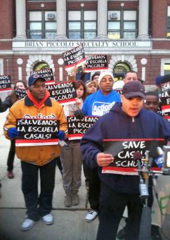 Parents and supporters speak to the press outside the Piccolo elementary school in Chicago (Lara Lindh | SW)