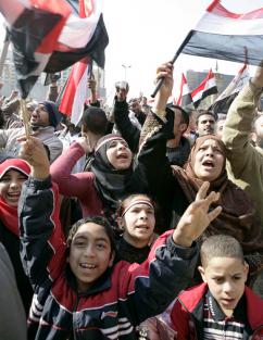 Crowds gathered outside the state television building to celebrate the downfall of Hosni Mubarak (Zuma)