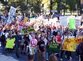 Antiwar protesters marched in Boston on the sixth anniversary of the congressional vote to authorize the Iraq war. (Keith Rosenthal | SW)