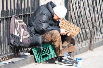 A man left homeless during the housing market crash sits at Broadway and 79th (Ed Yourdon)