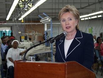 Hillary Clinton celebrates job creation in Haiti inside a clothing factory