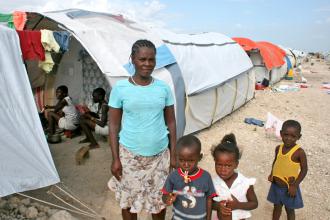 A family living in the Corail Cesselesse camp outside Port-au-Prince in July (Talea Miller)