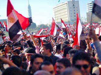 Egyptians celebrate the downfall of dictator Hosni Mubarak (Ahmed Al-Hilali)