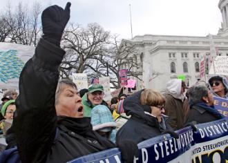 "The Women of Steel" join tens of thousands of other workers on the march in Madison (Jessie Reeder)