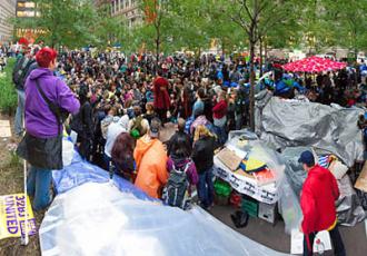 Hundreds of people poured into Liberty Plaza to defend it against a threatened eviction (Neil Girling)