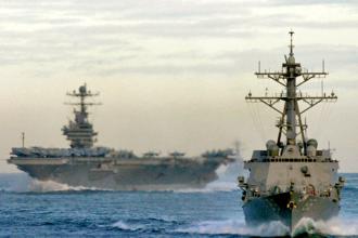 A U.S. aircraft carrier and guided missile destroyer  (Robert M. Cieri)