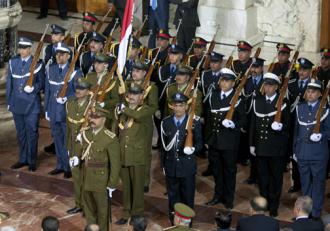 Representatives of Iraqi military and security forces at a ceremony in Baghdad (Staff Sgt. Caleb Barrieau)