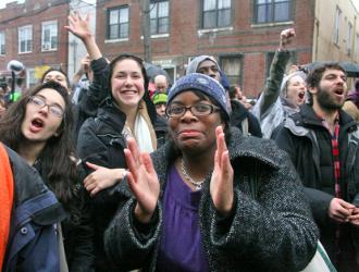 Occupy Wall Street rallying in support of a home reclaimed from foreclosure (Brennan Cavanaugh)