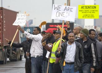 Striking truck drivers picket the Port of Seattle on February 8 (David Bacon)