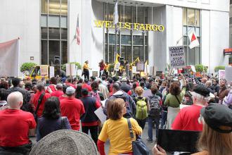 Hundreds march and rally outside a Wells Fargo shareholders meeting  (Ben Powless | Indybay.org)