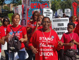 Thousands of teachers and their supporters marched through the West Side of Chicago (People's World)