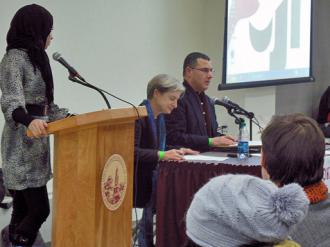 Panelists Judith Butler and Omar Barghouti (seated, left to right) speak out at Brooklyn College