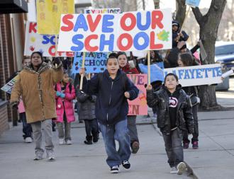 Students and parents at Lafayette Elementary School march against their school's threatened closure (Bill Healy)