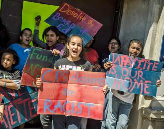 Students chant at the front doors of occupied Lafayette Elementary in Chicago (Sarah-ji)