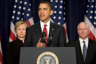President Barack Obama, flanked by Secretary of State Hillary Clinton and Defense Secretary Robert Gates (Lawrence L. Jackson)