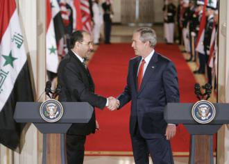 Iraqi Prime Minister Nuri al-Maliki with George W. Bush (Kimberlee Hewitt)