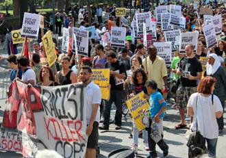 Some 15,000 people filled Fifth Avenue for the silent march against the NYPD's stop-and-frisk policy (Adriano Contreras)