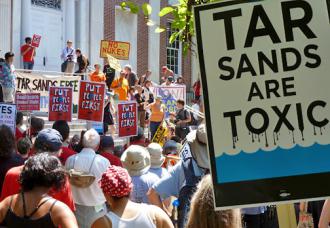Hundreds of activists descended on Burlington to protest a pro-corporate conference for governors (Nolan Rampy | SW)
