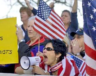 Anti-Muslim bigots harass attendees of a charity fundraiser at a community center in Yorba Linda, Calif.
