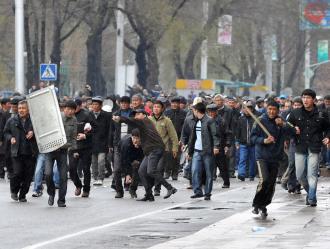 Opposition demonstrators during a confrontation with riot police in the capital of Bishkek (Vyacheslav Oseledko | AFP)