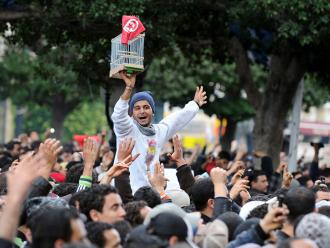 Thousands march in Tunis celebrating the toppling of the country's dictatorial president (Fethi Belaid | AFP/Getty Images)