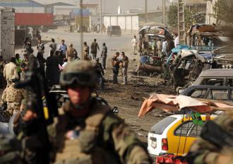 NATO soldiers on the scene of a bomb attack before elections in Afghanistan (Shah Marai | AFP)