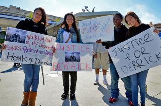 Protesters rally for justice for Derrick near the gas station where he was confronted by police (Alex Darocy | Indybay.org)