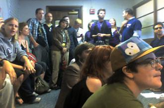 Supporters of same-sex marriage rights sit in at the San Diego County Administration Building to demand licences (Chuck Stemke | SW)