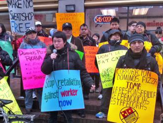 Domino's workers and their supporters picket in front of a franchise in Manhattan (Gary Lapon | SW)