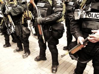 Riot police confront Occupy protesters in New York City