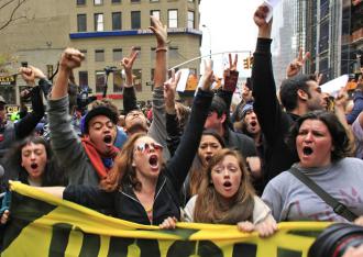Occupy protesters march toward Liberty Plaza after police evicted them in the early morning hours (Eduardo Munoz | Reuters)
