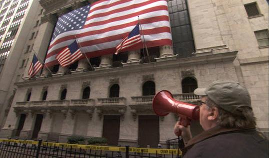Michael Moore confronts the Wall Street thieves in Capitalism: A Love Story
