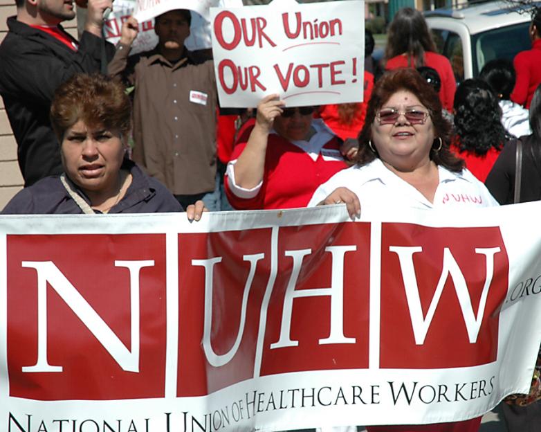 Supporters of the National Union of Healthcare Workers march in protest of SEIU's harassment