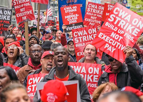 Verizon strikers and their supporters in the streets of New York