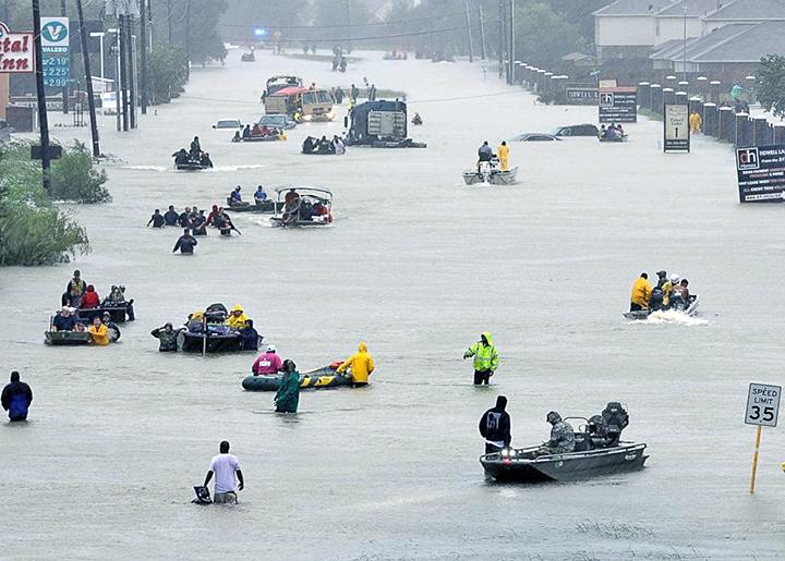 Thousands attempt to flee the devastating flooding in Houston, Texas