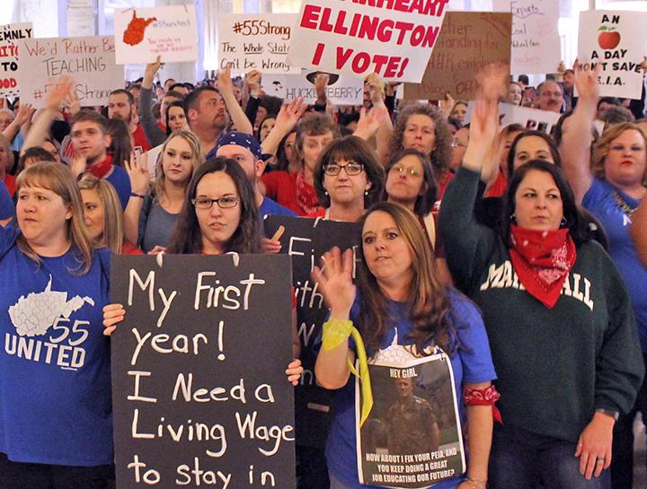 Striking teachers rally for their demands in the West Virginia state Capitol building