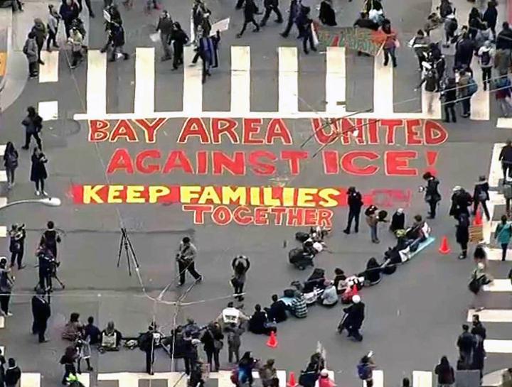 Immigrant rights activists in the Bay Area stage a sit-in against ICE terror
