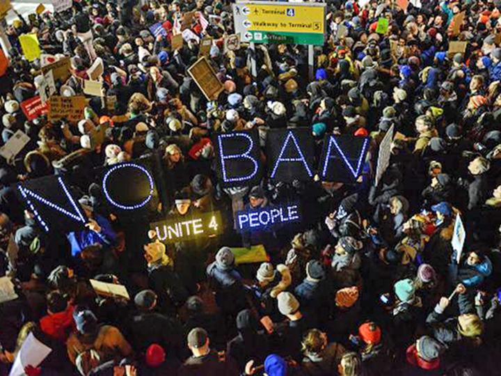 Thousands of pro-immigrant protesters flock to JFK Airport in New York City