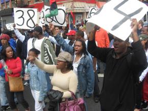 Hundreds of people marched through Harlem in protest of the not-guilty verdict reached in the trial of three NYPD officers who shot Sean Bell, April 26, 2008