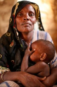 A woman and her granddaughter in a settlement for internally displaced persons in South Galkayo, Somalia.