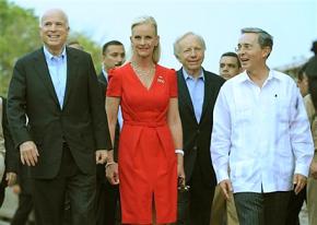 John McCain and Joe Lieberman went to Colombia for a visit with right-wing President Alvaro Uribe (right) as the military carried out a high-profile hostage rescue
