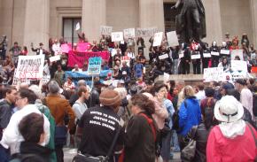 Hundreds of people gathered in front of the New York Stock Exchange to protest the government bailout for Wall Street