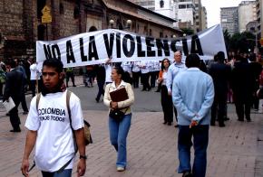 Protesters in Bogota, Colombia, march for an end to paramilitary violence