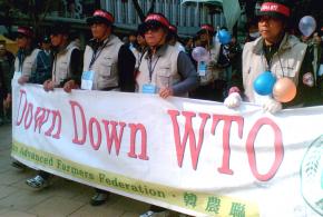 South Korean farmers protest a meeting of the World Trade Organization