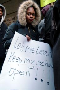 Protesting the threatened closure of 16 public schools in Chicago.